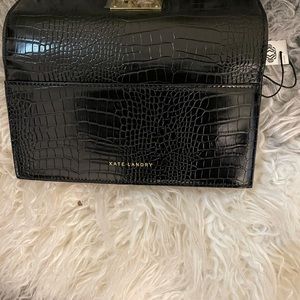 Kate Landry purse never used?